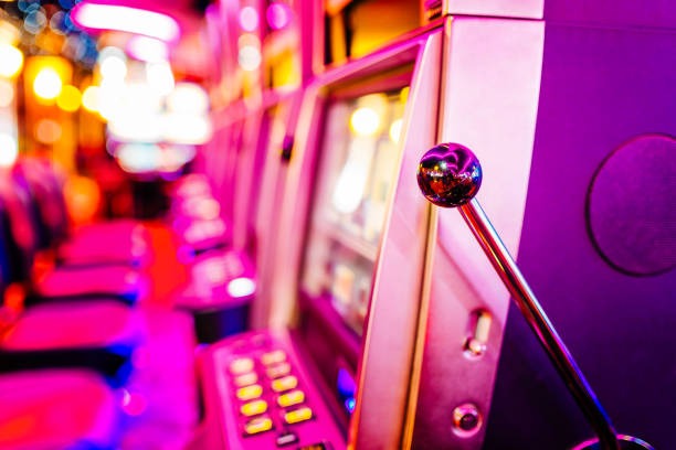 Live dealer studio showing Sic Bo game with numbered tiles and result display